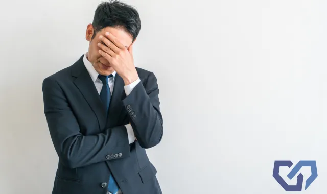 悩む人