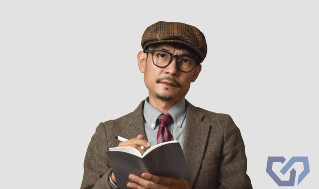 メモを取る男性